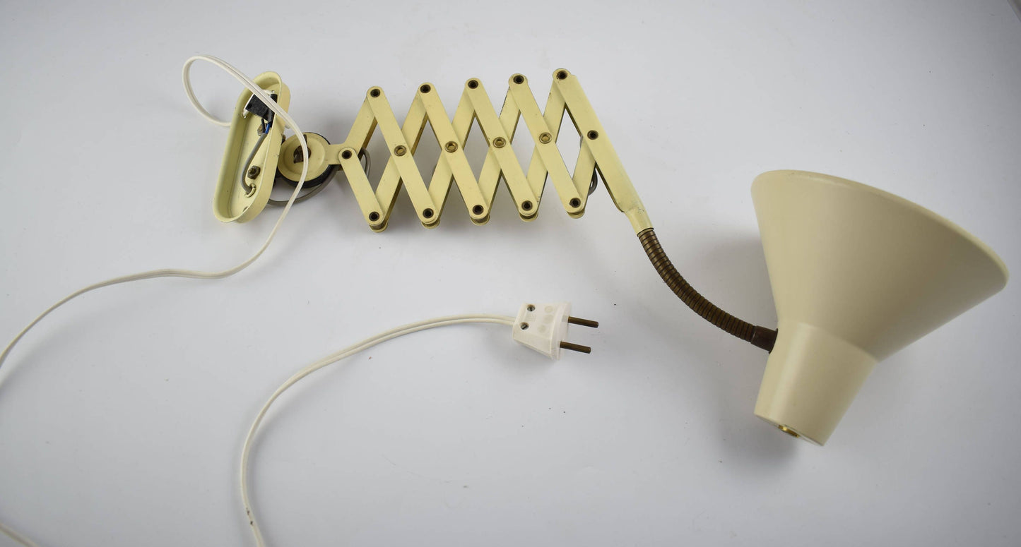 Light yellow scissors wall lamp from the 60s harmonica wall light from dutch company Hala