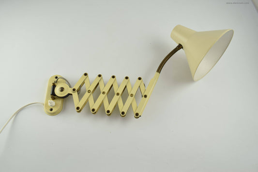 Light yellow scissors wall lamp from the 60s harmonica wall light from dutch company Hala