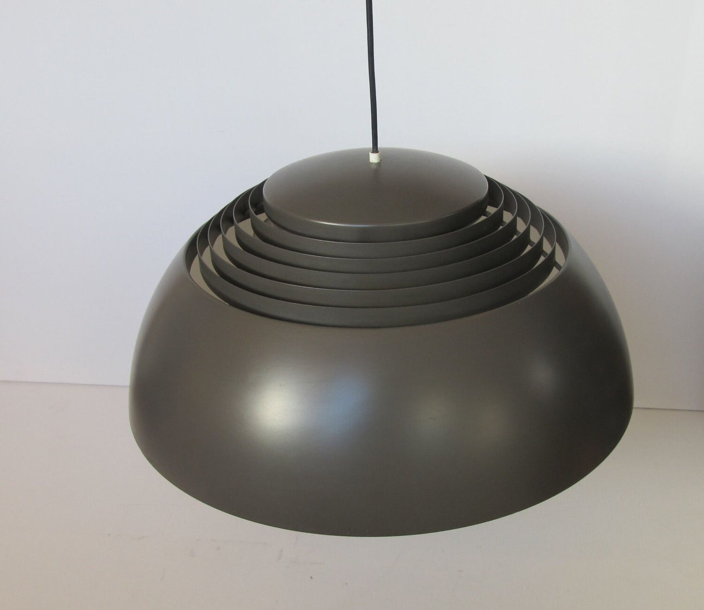 Reserved for H.  Arne Jacobsen AJ Royal ceiling light, for Scandinavian manufacturer Louis Poulsen, known as AJ Royal Pendant